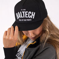 Haltech Snap Back Black with White Text Size: One size fits all.