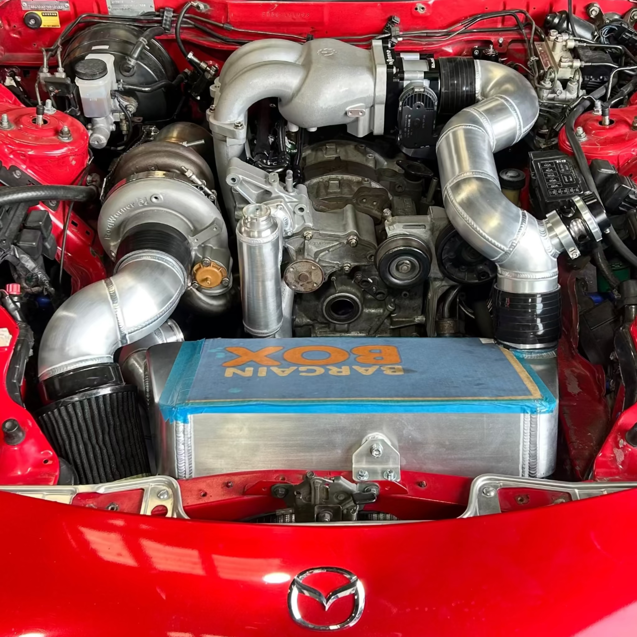 installed view of Vinny Fab T4 twin scroll turbo manifold for Mazda FD3S RX-7