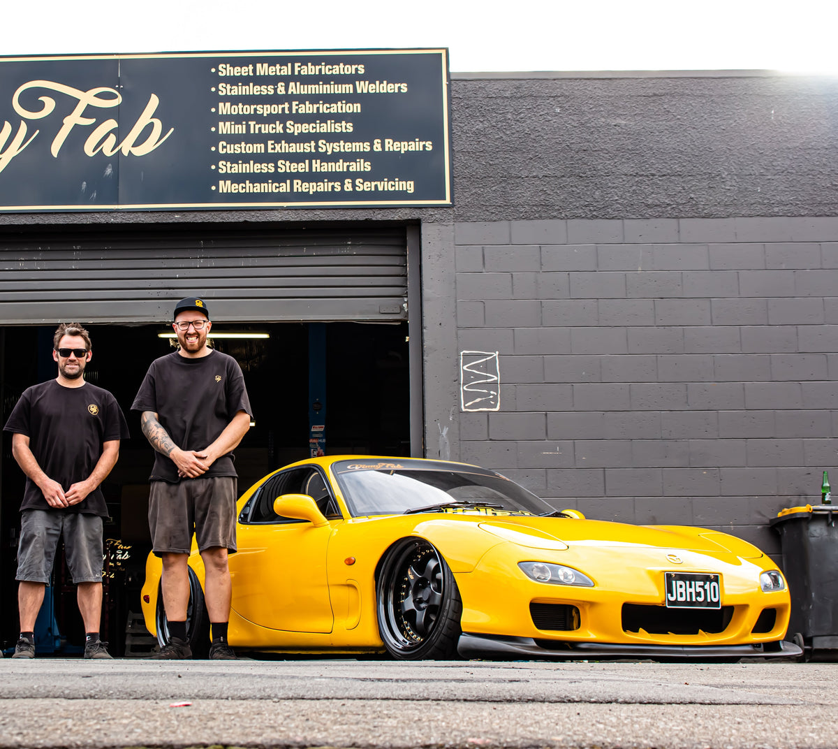 The Vinny Fab team outside the workshop